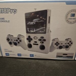 White Handheld Gaming Console with Dual Controllers